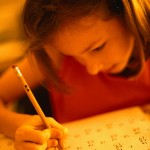Young Girl Does Her Math Homework